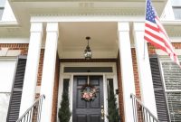 Brick House Exterior Makeover: White Trim and Black Shutters