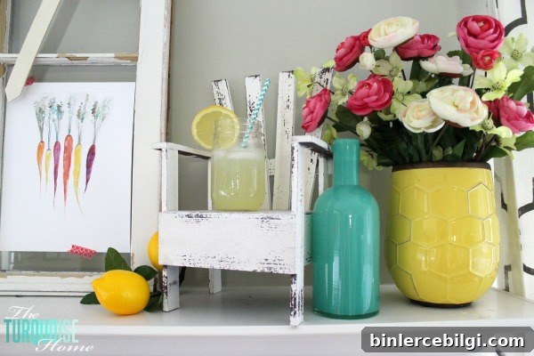 I love these fresh pops of colors and citrus inspiration on this fun summer mantel! A Garden and Lemonade Stand Summer Mantel. Get all the juicy details at TheTurquoiseHome.com
