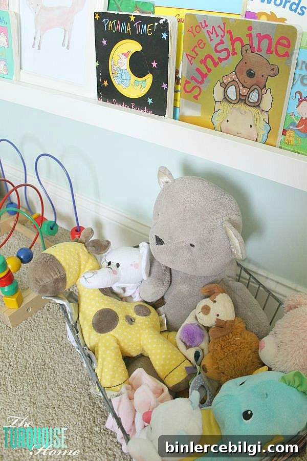 All of the pretty pink and turquoise touches with a woodland theme make a sweet retreat for any little girl. | Baby Girl's Woodland Nursery | All the details at TheTurquoiseHome.com 