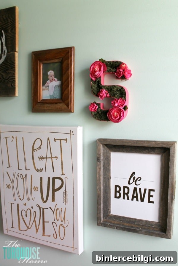 All of the pretty pink and turquoise touches with a woodland theme make a sweet retreat for any little girl. | Baby Girl's Woodland Nursery | All the details at TheTurquoiseHome.com