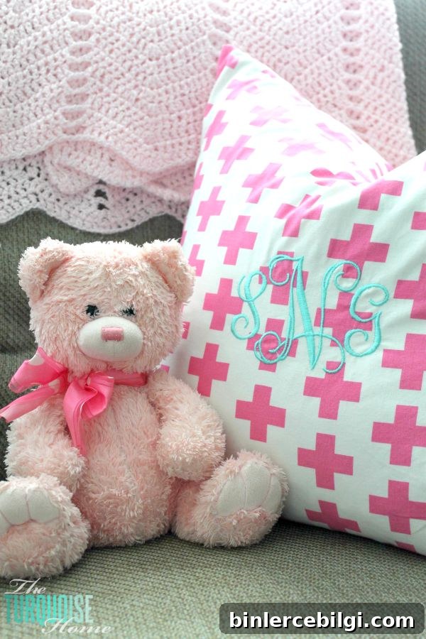 All of the pretty pink and turquoise touches with a woodland theme make a sweet retreat for any little girl. | Baby Girl's Woodland Nursery | All the details at TheTurquoiseHome.com