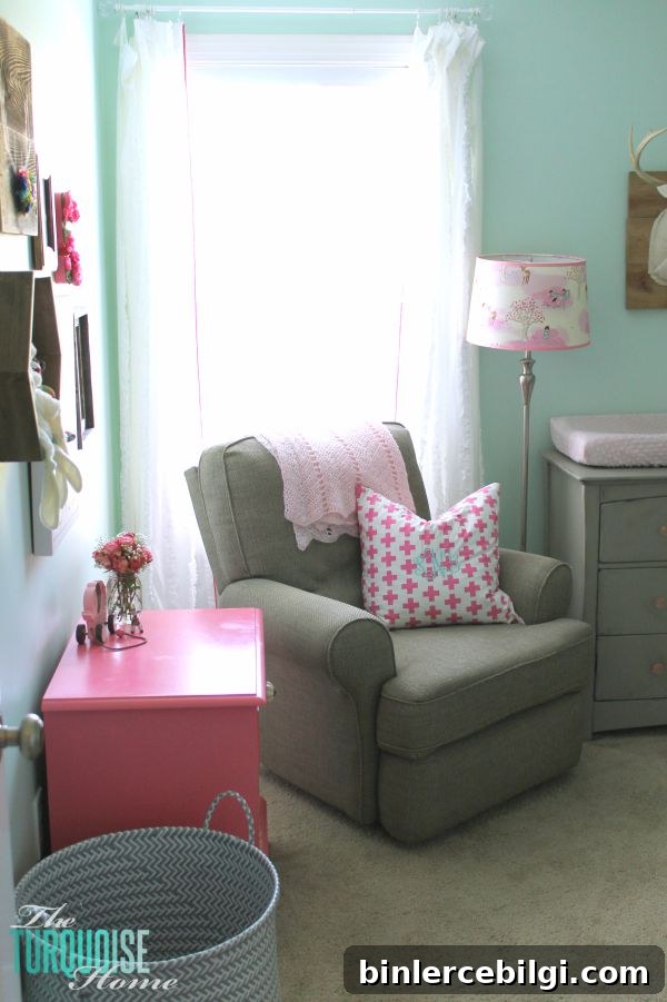 All of the pretty pink and turquoise touches with a woodland theme make a sweet retreat for any little girl. | Baby Girl's Woodland Nursery | All the details at TheTurquoiseHome.com 