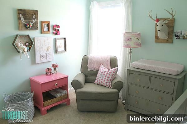 All of the pretty pink and turquoise touches with a woodland theme make a sweet retreat for any little girl. | Baby Girl's Woodland Nursery | All the details at TheTurquoiseHome.com 