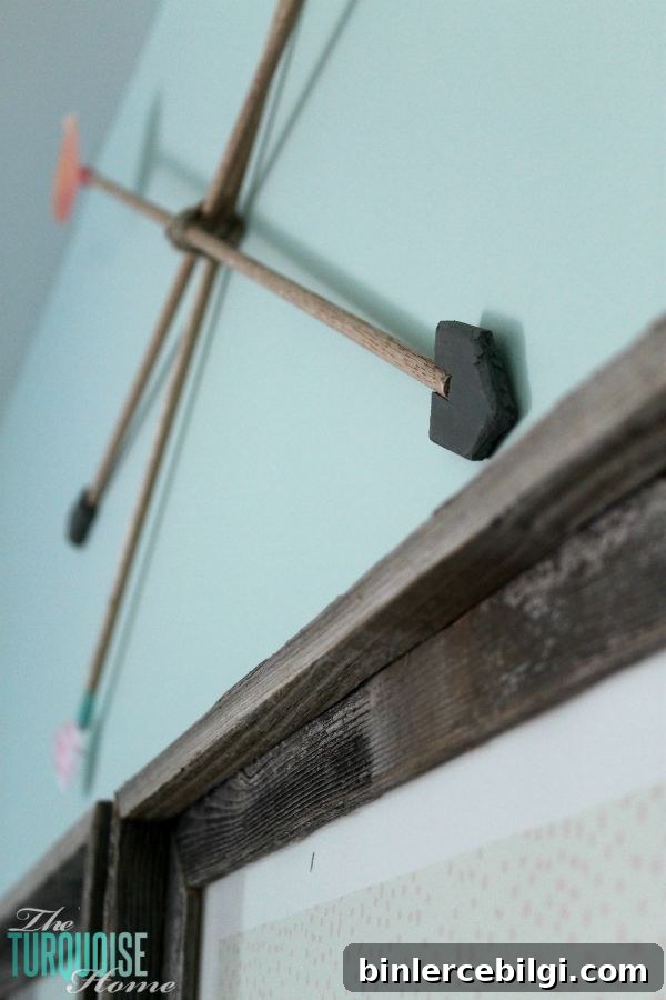 DIY Decorative Arrow Projects for Wall Decor 3 These DIY decorative arrows are so inexpensive and cute! The perfect finishing touch to a girl's woodland nursery. | Details at TheTurquoiseHome.com