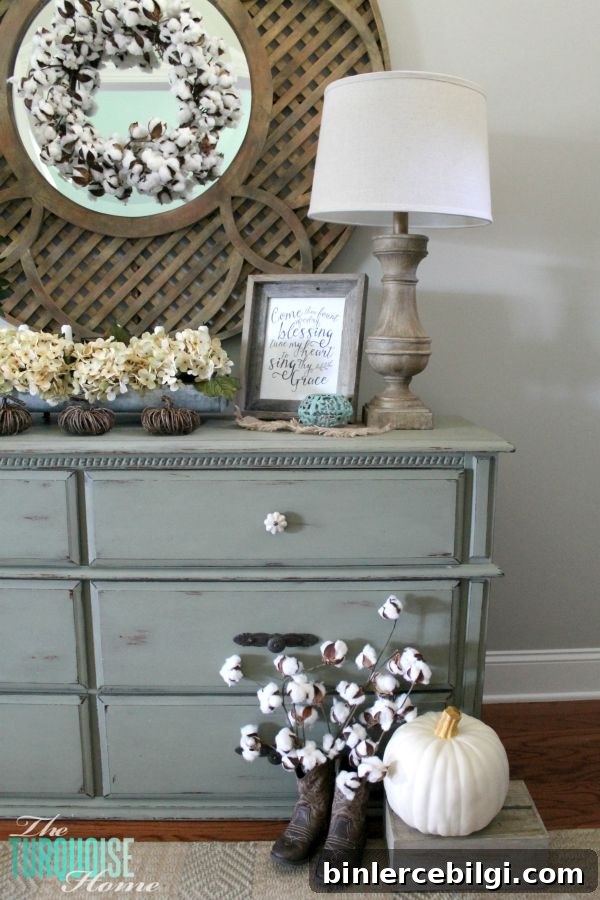The temps are cooling down and it's time to break out the sweaters and the boots. Love this neutral fall vignette! (and a Come Thou Fount free printable) | Details and Printable at TheTurquoiseHome.com
