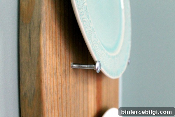 Make this DIY Industrial Plate Rack for less than $10! | Tutorial at TheTurquoiseHome.com