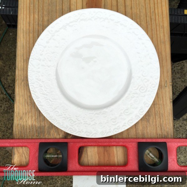 Make this DIY Industrial Plate Rack for less than $10! | Tutorial at TheTurquoiseHome.com