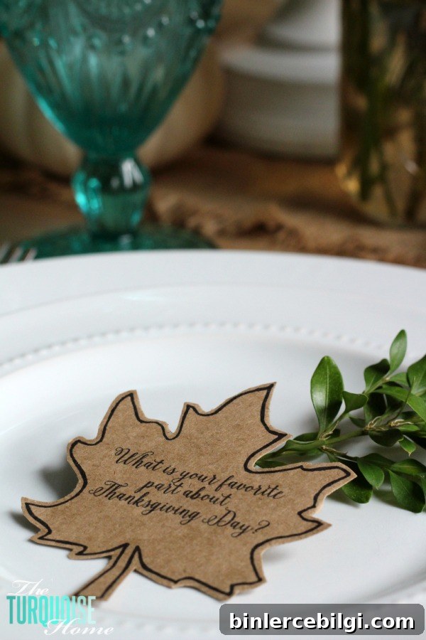 Gorgeous! This pretty, colorful fall or Thanksgiving tablescape is just beautiful with pops of turquoise, orange and red! And those beautiful goblets are my fave!