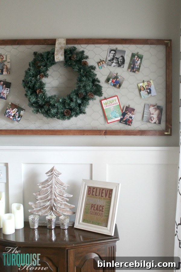 Easy framed chicken wire Christmas card holder | Simple Winter and Christmas Decor in the Living Room | TheTurquoiseHome.com
