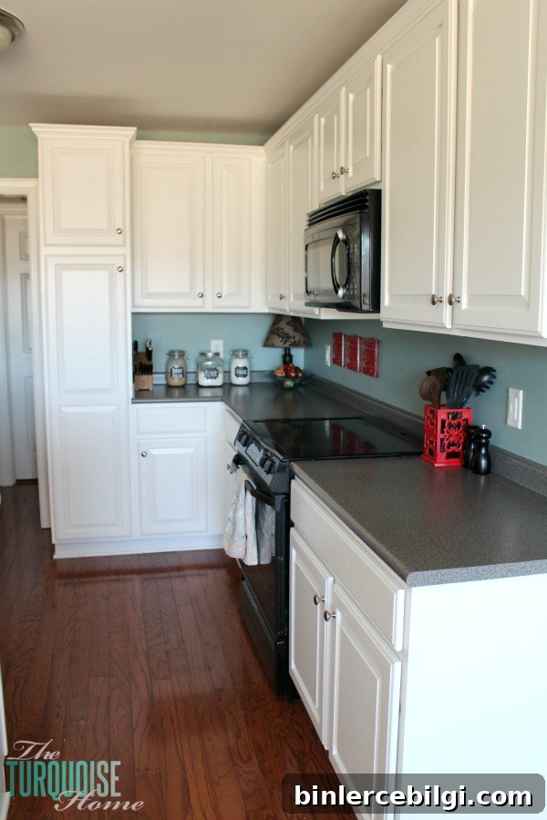 DIY Painted Kitchen Cabinets with Benjamin Moore Simply White 