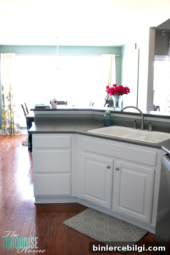 DIY Painted Kitchen Cabinets with Benjamin Moore Simply White 