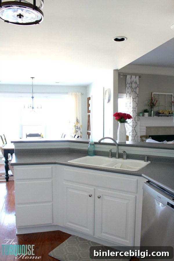 Kitchen painted in Sea Salt with decorative clock
