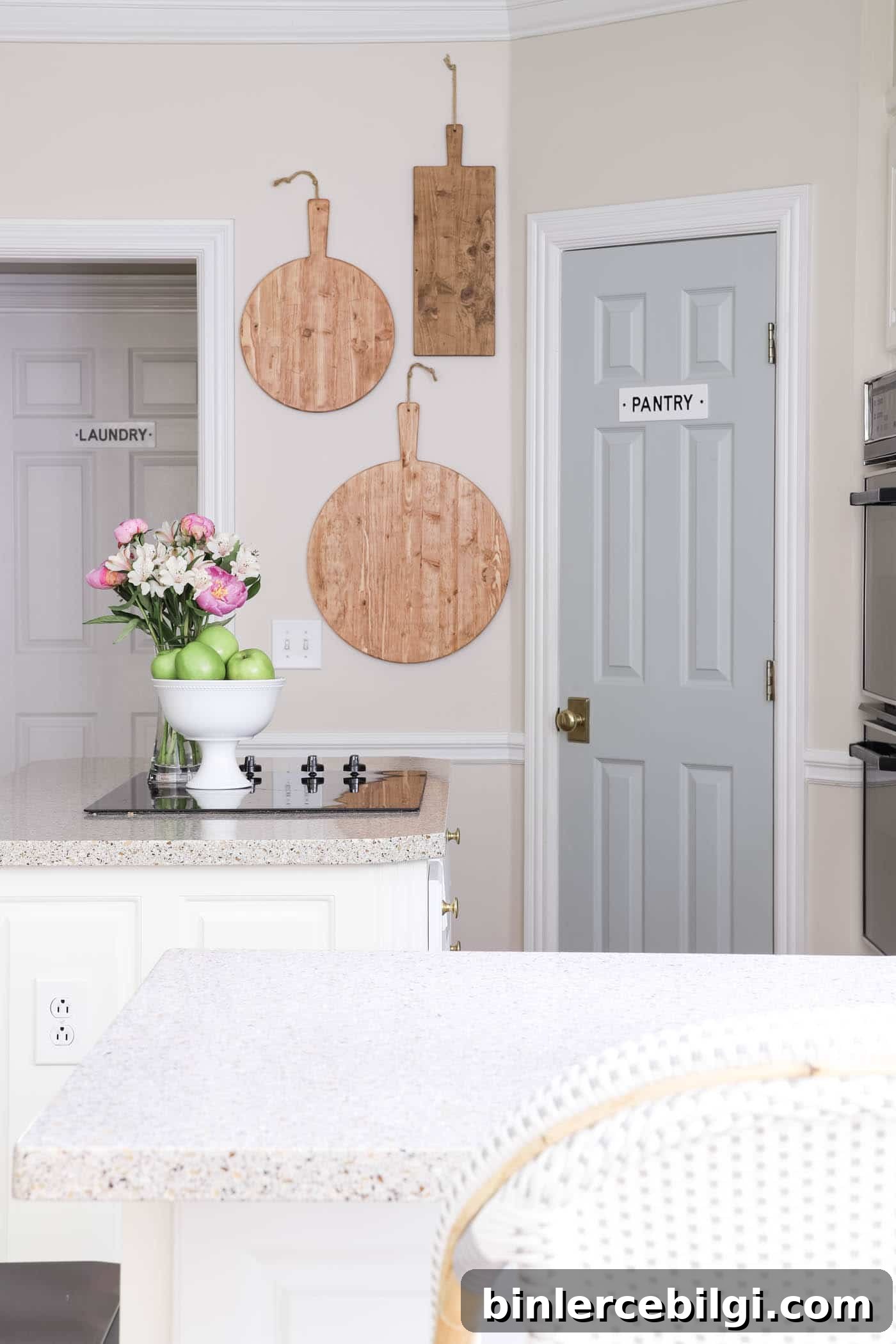 Charcuterie and pizza boards on the wall