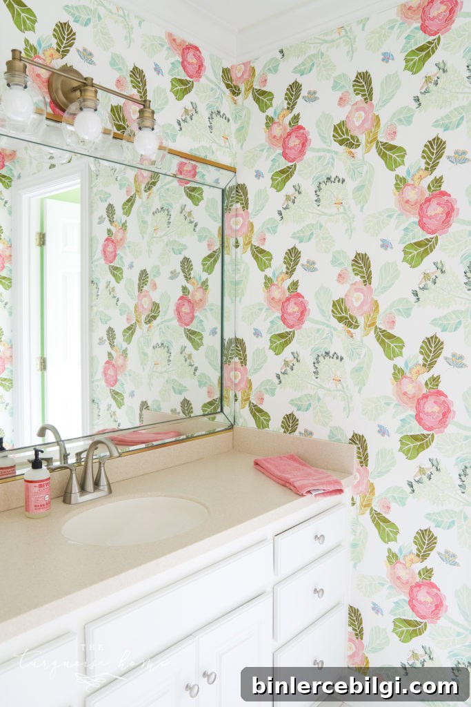 Floral wallpaper in a girls' bathroom