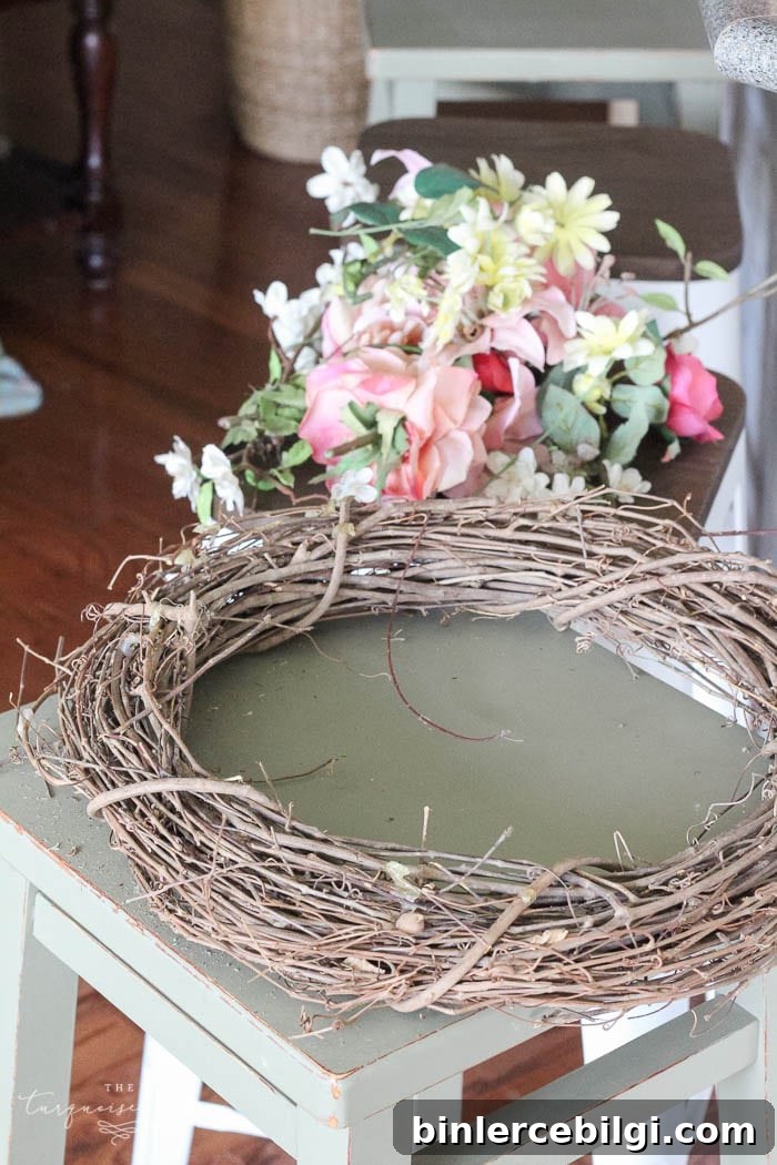 Use a new or recycled grapevine wreath for your DIY fall wreath. I recycled an old wreath from my wedding. 