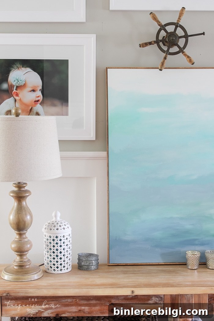 Simple, large photos create a unified photo gallery wall in the living room!