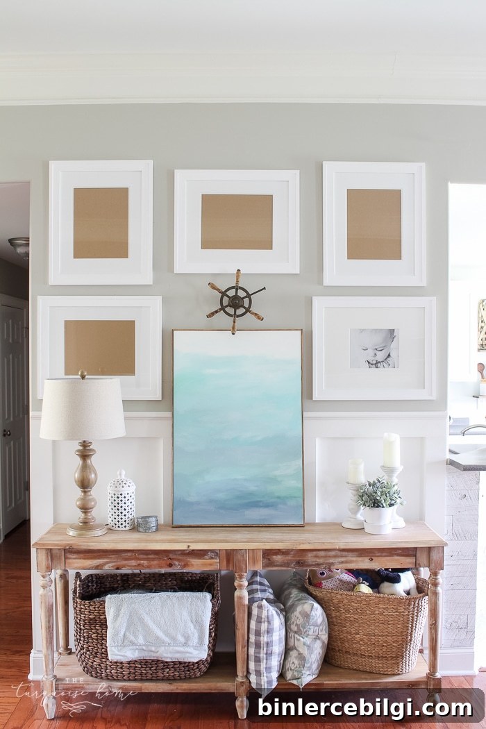 The living room gallery wall with a console table and frames.