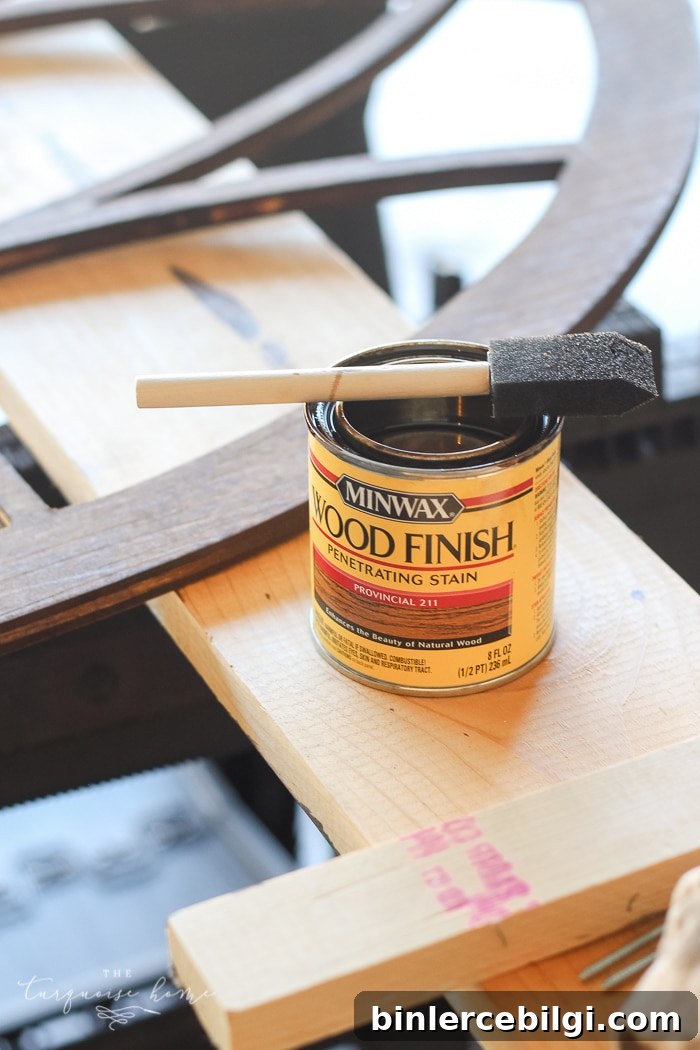 Step 1: stain your window frame | LOVE this look for less! DIY Fixer Upper-style Cathedral Window Frame