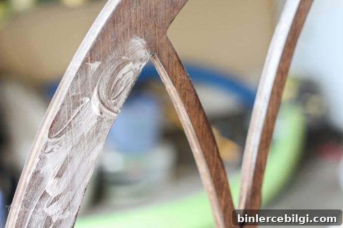 Step 2: add a white paint and clear wax finish | LOVE this look for less! DIY Fixer Upper-style Cathedral Window Frame