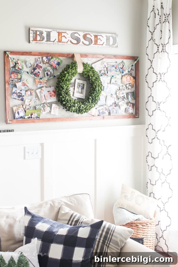 Pretty magnolia wreath Christmas mantel decor brings a rustic feel to the holiday season. Pops of navy and dusty blue are festive, yet unexpected! | Gorgeous Magnolia Wreath Christmas Mantel Decor