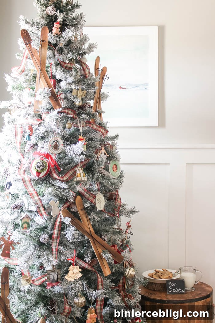 Pretty magnolia wreath Christmas mantel decor brings a rustic feel to the holiday season. Pops of navy and dusty blue are festive, yet unexpected! | Gorgeous Magnolia Wreath Christmas Mantel Decor