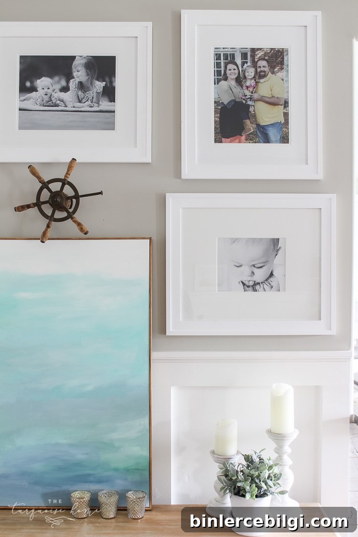Simple, large photos create a unified photo gallery wall in the living room!