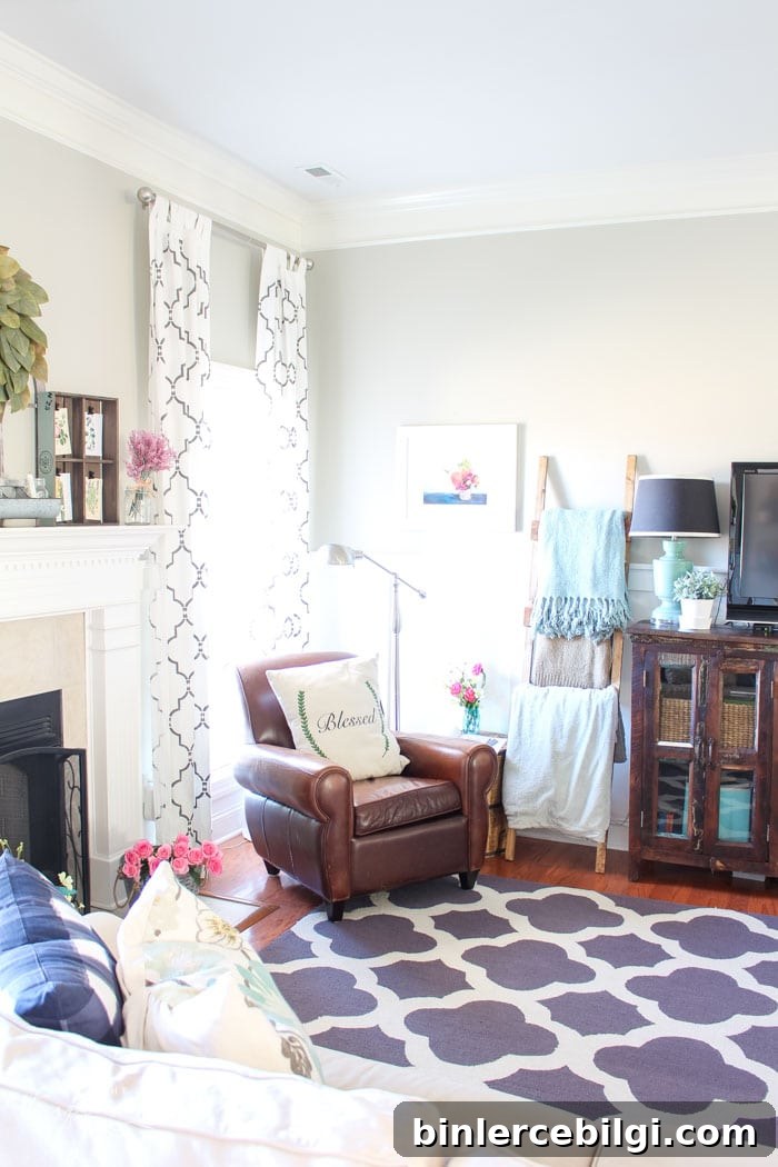 Isn't this just the prettiest pink and turquoise mantel?! Simple Floral Spring Mantel