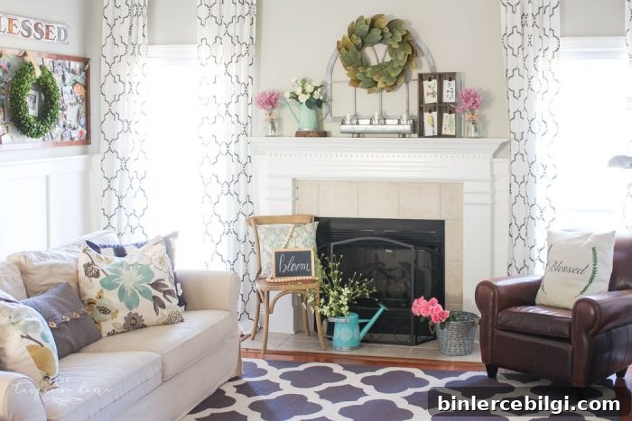Isn't this just the prettiest pink and turquoise mantel?! Simple Floral Spring Mantel