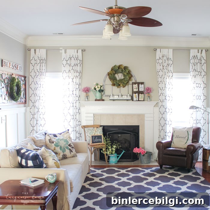 Isn't this just the prettiest pink and turquoise mantel?! Simple Floral Spring Mantel