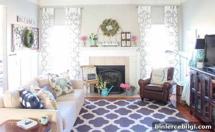 Isn't this just the prettiest pink and turquoise mantel?! Simple Floral Spring Mantel