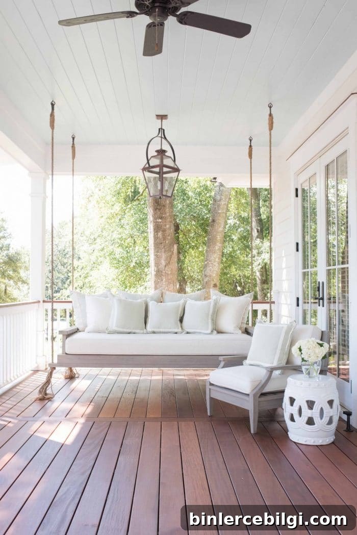 Inspiring Front Porch Decor Ideas to Boost Curb Appeal 5 Daybed on porch with haint blue ceiling