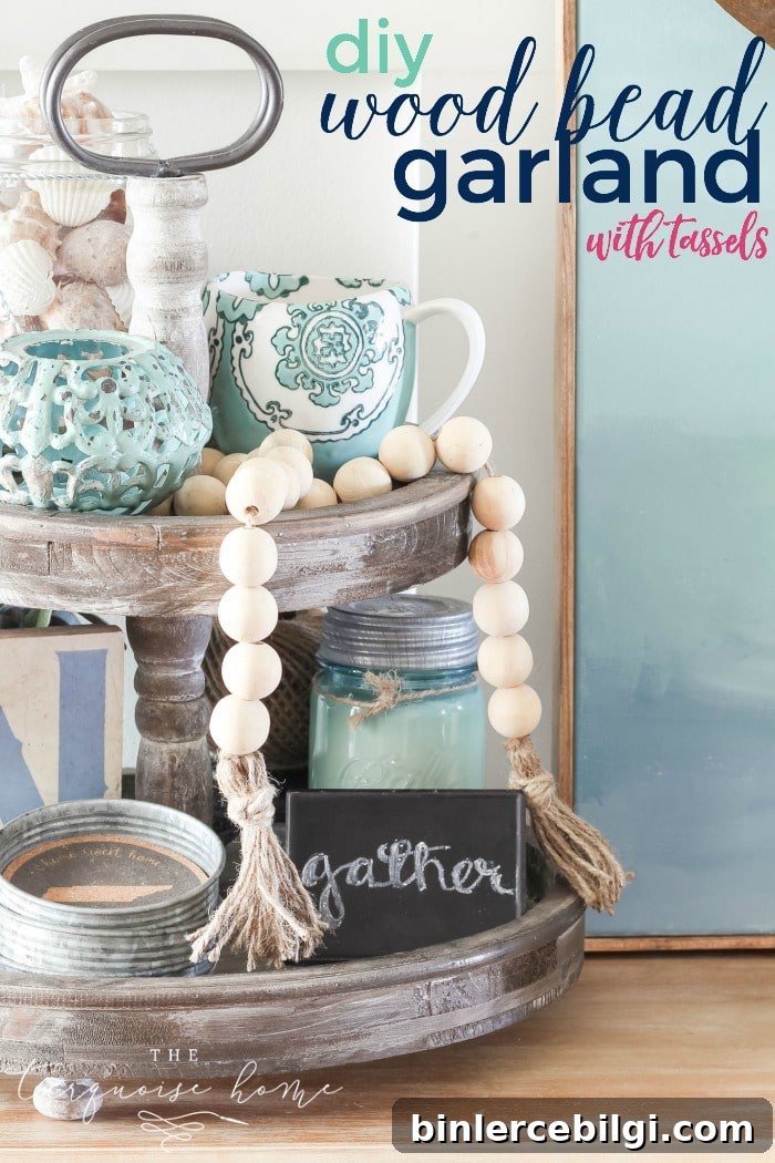 Super cute DIY Wood Bead Garland with Tassels is so easy and fun to make! Cheap, too!!