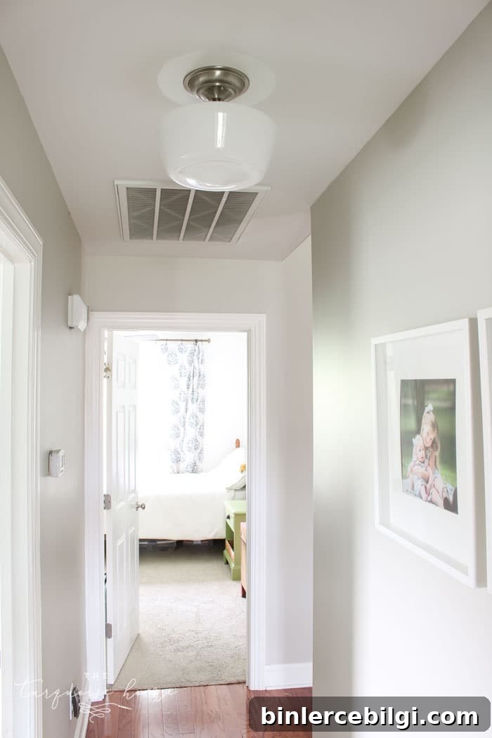Updated hallway with schoolhouse lighting