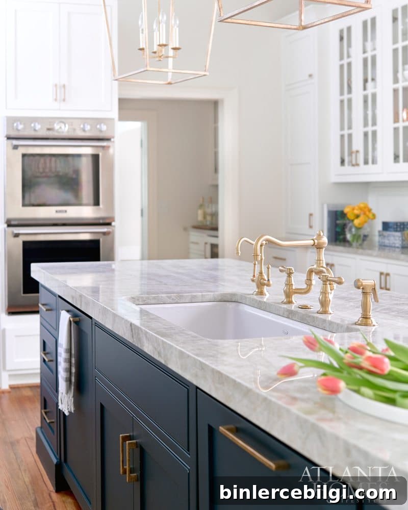 Navy Kitchen Island with brass sink faucet hardware.