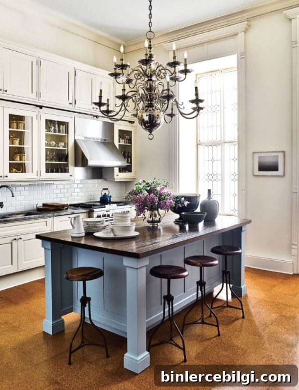 A Moody Blue Island in a cream kitchen.