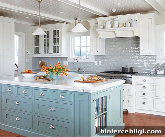 A Cornflower Blue kitchen Island with white outer cabinets.