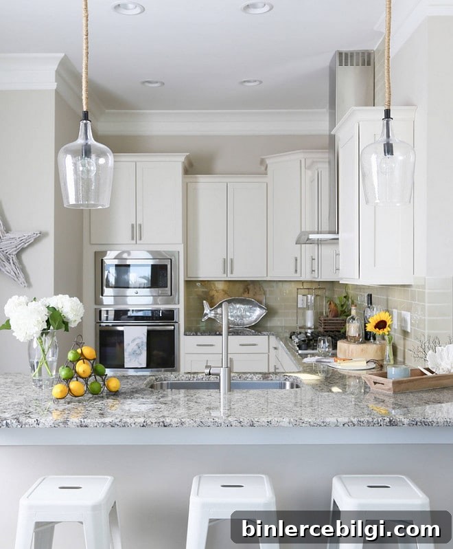 Gorgeous Dover White painted cabinets and Alabaster walls - both colors from Sherwin Williams. LOVE these two colors together! | Top Favorite White Paint Colors