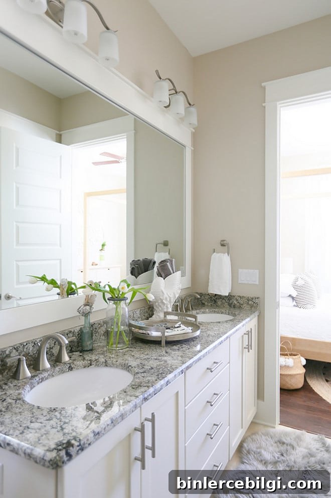 Gorgeous Dover White painted cabinets and Alabaster walls - both colors from Sherwin Williams. LOVE these two colors together! | Top Favorite White Paint Colors