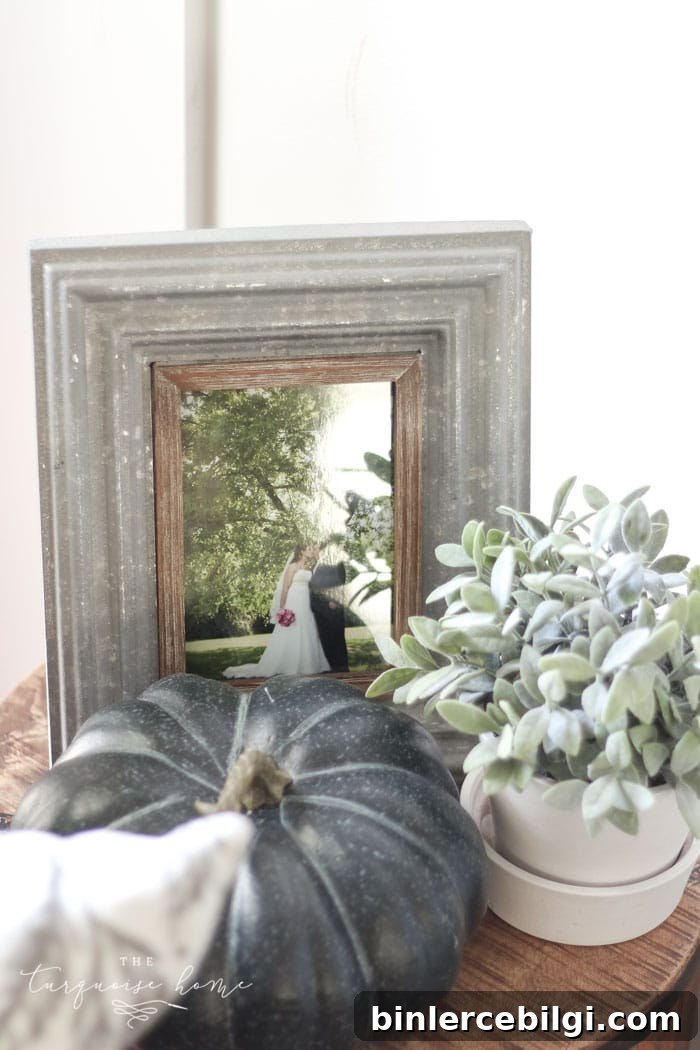 Simple farmhouse fall mantel with a DIY wooden sign 