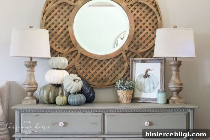 such a simple fall vignette in the entry way ... love the blues and greens!