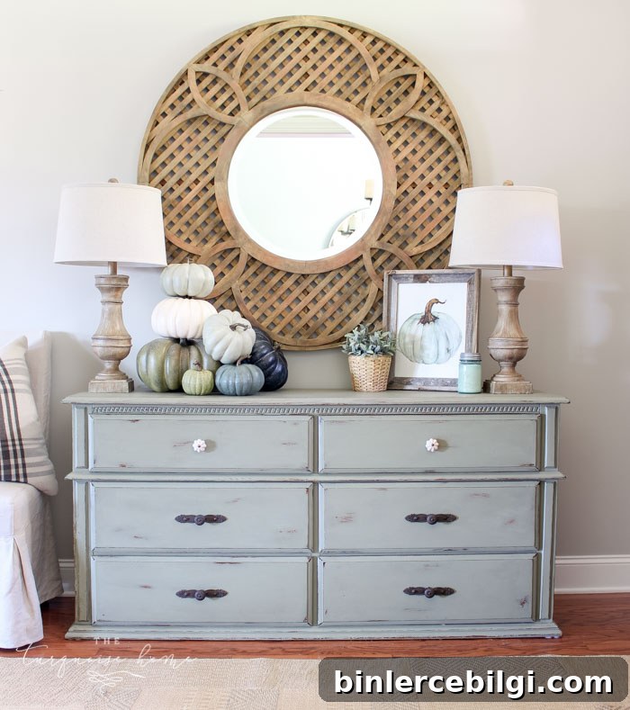 Simple, neutral blues and greens fall entry way ...