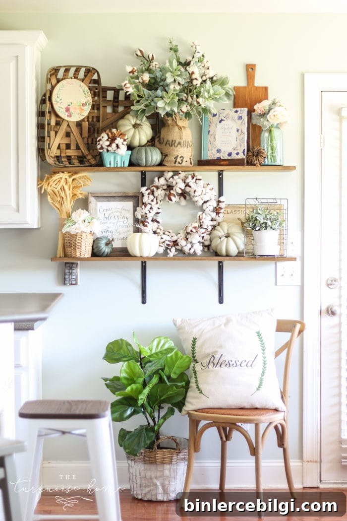 Gorgeous fall farmhouse kitchen shelves with blue, green and blush decor!