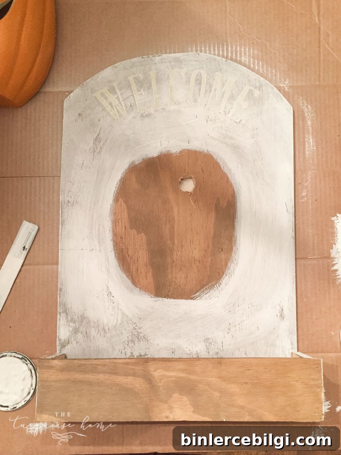 Paint the candy holder with chalk paint except for where the pumpkin will go and the very front of the box!
