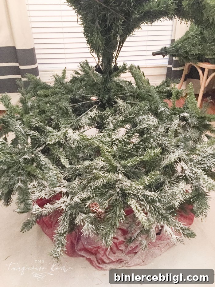 How to Flock a Christmas Tree the easy way! Flock the tree as you go!
