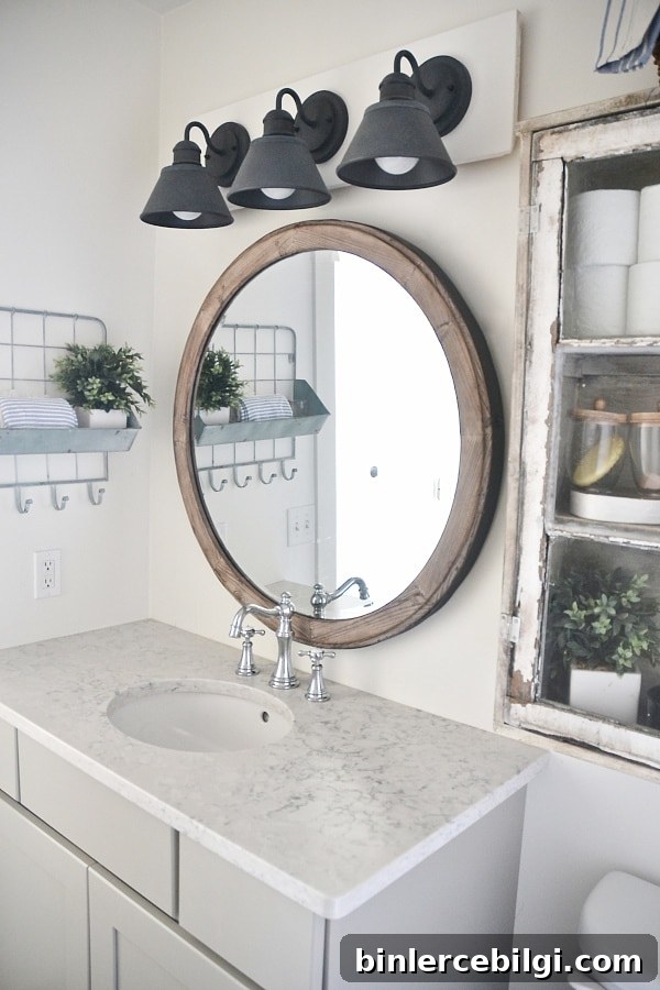 Farmhouse Bathroom Essentials: Key Design Elements 16 DIY vanity light and farmhouse bathroom details