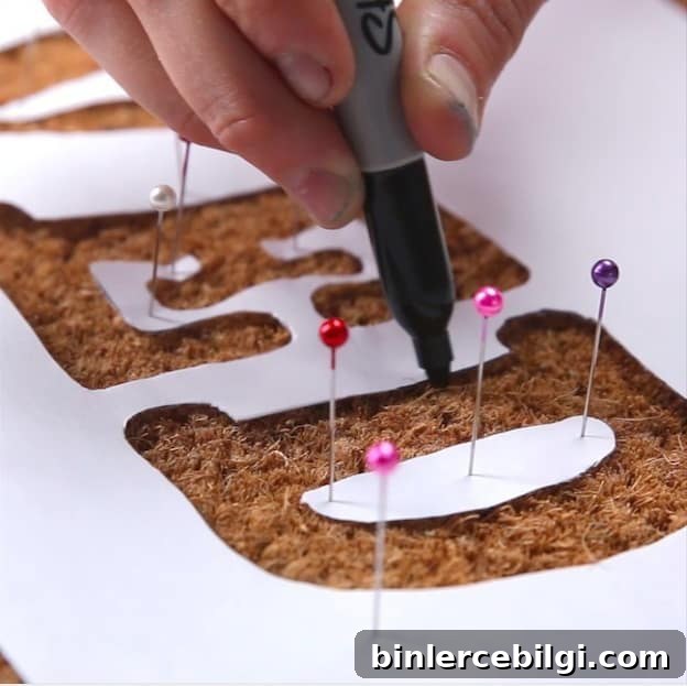 Hold down the stencil with straight pins! | DIY Doormat