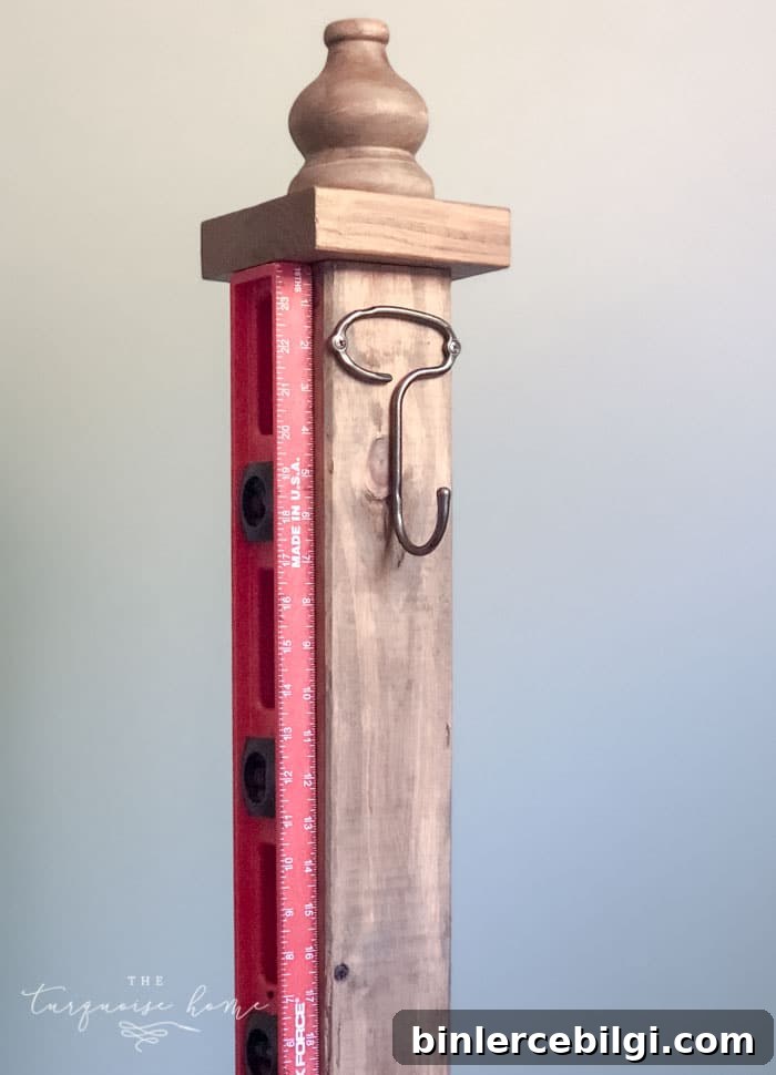 DIY Wooden Coat Rack: Step-by-Step Build Guide 13 Add decorative hooks to your standing coat rack. | DIY Coat Rack | #buildyourownathome #diyproject #diy #buildlikeagirl