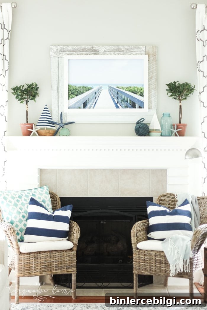 A coastal summer mantel decor ideas. Add a little nautical charm to your living space with these simple coastal summer mantel decor ideas. Featuring DIY beach canvas art, blue & white starfish, textured sailor's knot and cheerfully striped sail boats, this mantel looks great for the seasonally inspired.