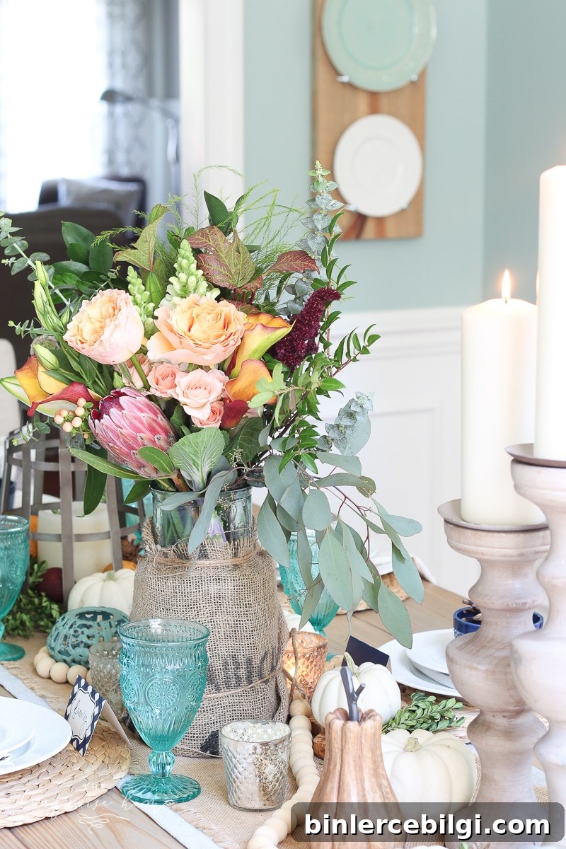 Farmgirl Flowers Fall Tablescape with pumpkins & turquoise goblets.