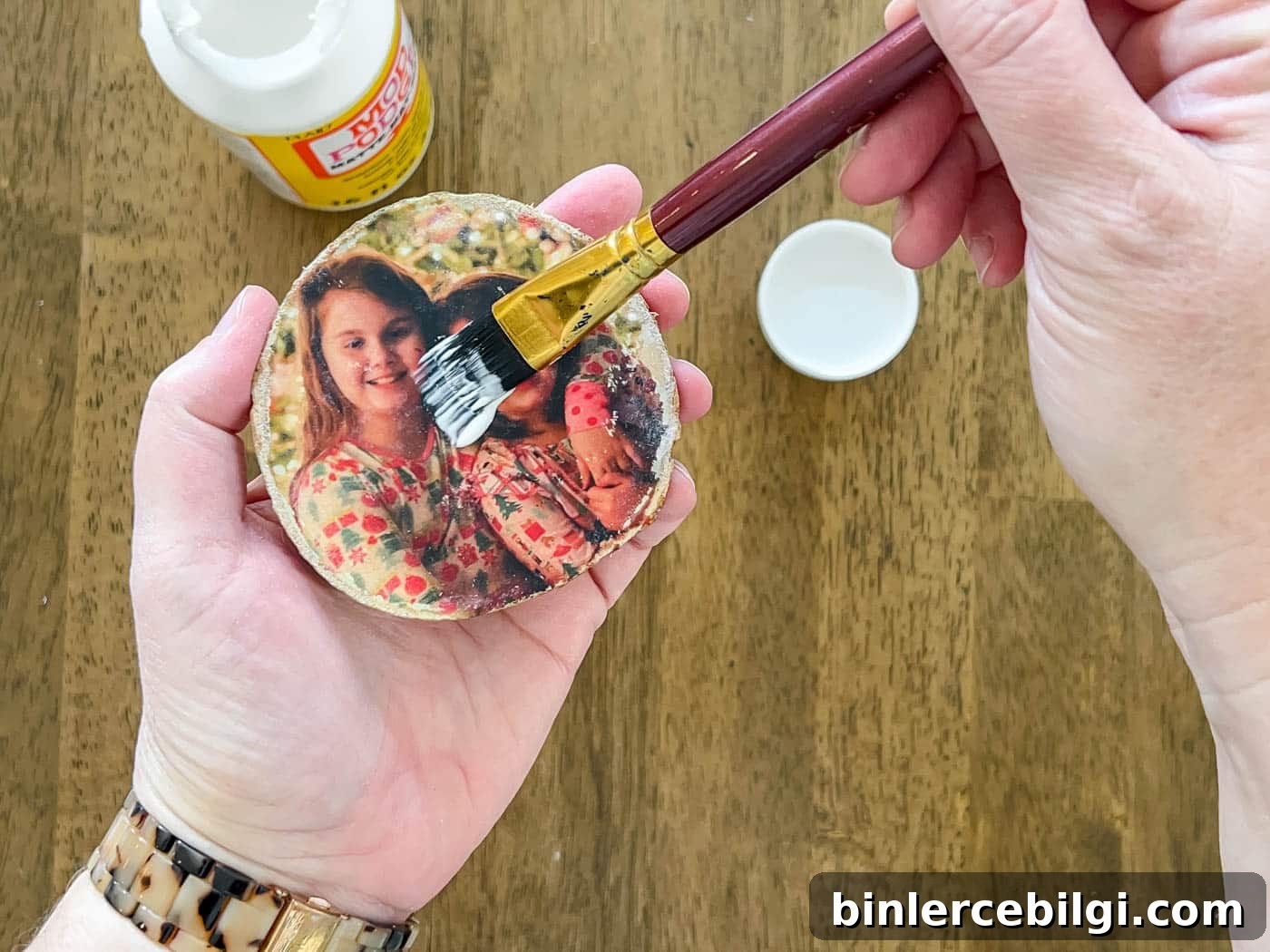 Mod Podge to seal the photo transfer to wood